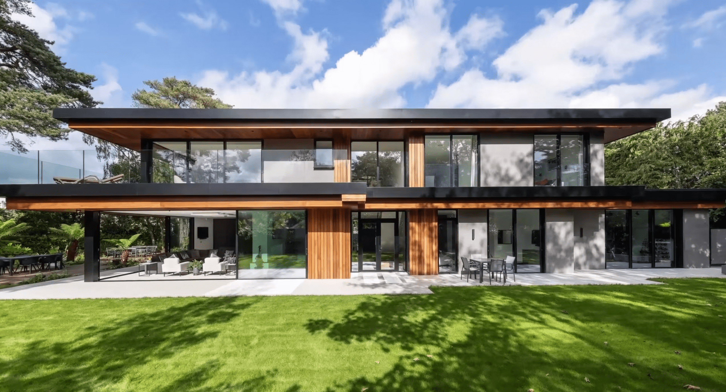 preview video of new build home with sliding doors and invisible glass balconies