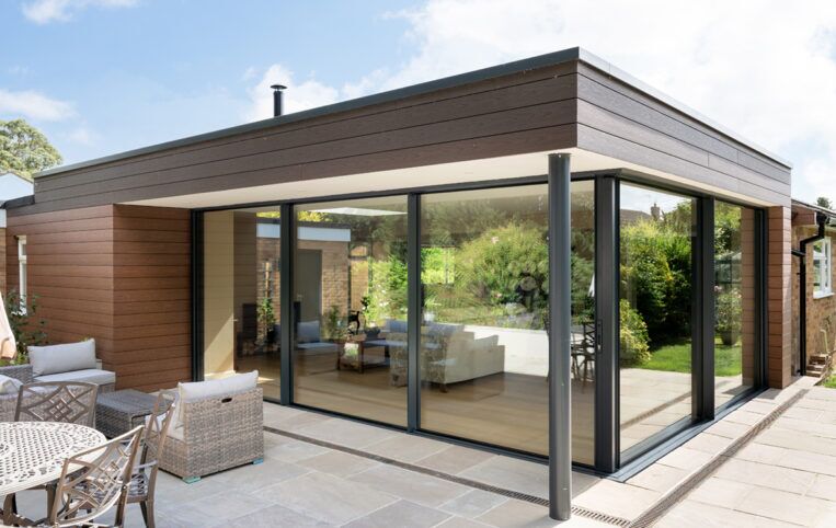 Corner sliding doors for bungalow extension